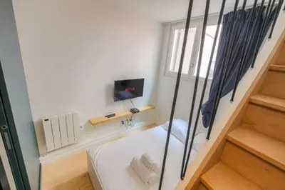 Télévision ou salle de divertissement dans l'établissement Cosy et Calme en hypercentre