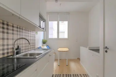 Cuisine ou kitchenette dans l'établissement Cosy et Calme en hypercentre