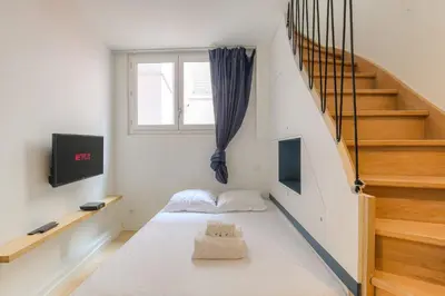 Un ou plusieurs lits dans un hébergement de l'établissement Cosy et Calme en hypercentre