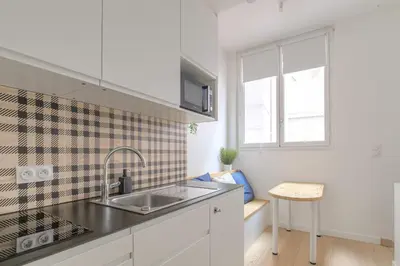 Cuisine ou kitchenette dans l'établissement Cosy et Calme en hypercentre