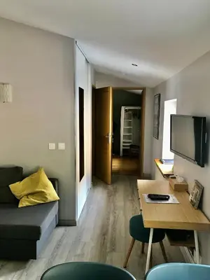 Coin salon dans l'établissement Maison d'hôtes Côté Saône