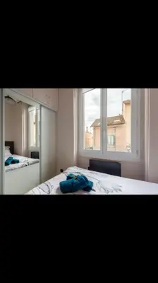 Un ou plusieurs lits dans un hébergement de l'établissement Appartement totalement rénové 4 couchage proche Lyon