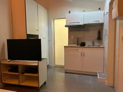 Cuisine ou kitchenette dans l'établissement Studio villeurbanne
