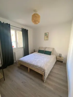 Un ou plusieurs lits dans un hébergement de l'établissement Appartement proche CNPE et PIPA