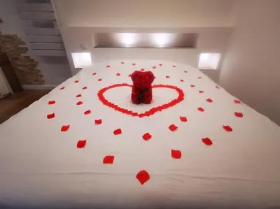 Un ou plusieurs lits dans un hébergement de l'établissement Le Temple du SPA