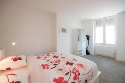 Un ou plusieurs lits dans un hébergement de l'établissement Lac Ness - Bel appartment central Part-Dieu
