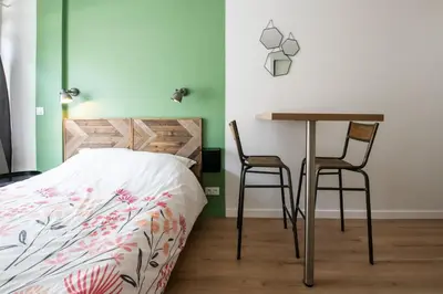 Un ou plusieurs lits dans un hébergement de l'établissement Central Part-Dieu - Appartement 1