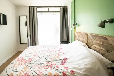 Un ou plusieurs lits dans un hébergement de l'établissement Central Part-Dieu - Appartement 1