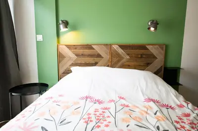 Un ou plusieurs lits dans un hébergement de l'établissement Central Part-Dieu - Appartement 1