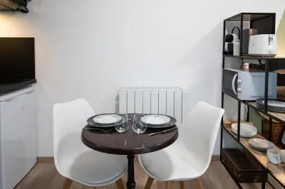 Cuisine ou kitchenette dans l'établissement Suite Kella Tassin - Beau studio rénové