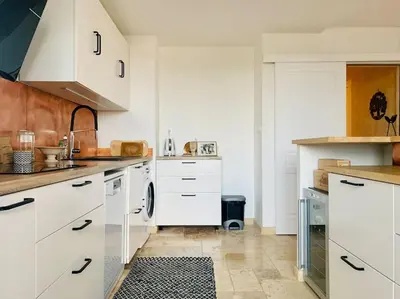 Cuisine ou kitchenette dans l'établissement Spacieux T3 climatisé avec parking proche gare