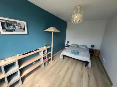 Un ou plusieurs lits dans un hébergement de l'établissement Appartement 6-8 personnes, accès direct à Lyon