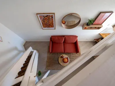 Coin salon dans l'établissement BnGo I L'Élégant I Duplex Croix-Rousse vue sur Fourvière, 2 personnes, Cosy et moderne