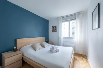 Un ou plusieurs lits dans un hébergement de l'établissement Le cinquième ciel - 75m2 avec garage privé