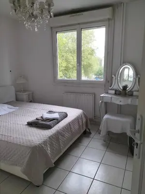 Un ou plusieurs lits dans un hébergement de l'établissement Chambre etoile