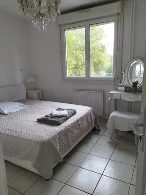 Un ou plusieurs lits dans un hébergement de l'établissement Chambre etoile