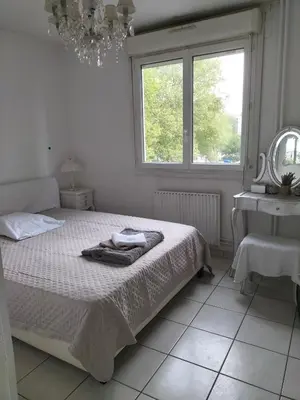 Un ou plusieurs lits dans un hébergement de l'établissement Chambre etoile