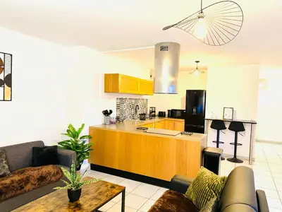 Cuisine ou kitchenette dans l'établissement *Le Golden Tropic* Magnifique T4 Terrasse+Parking
