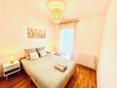 Un ou plusieurs lits dans un hébergement de l'établissement *Le Golden Tropic* Magnifique T4 Terrasse+Parking