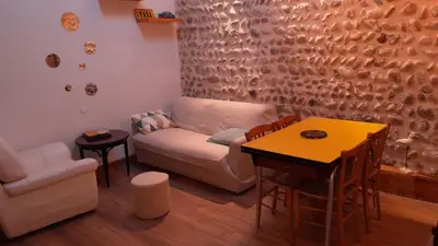 Coin salon dans l'établissement gite du lavoir