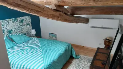 Un ou plusieurs lits dans un hébergement de l'établissement gite du lavoir