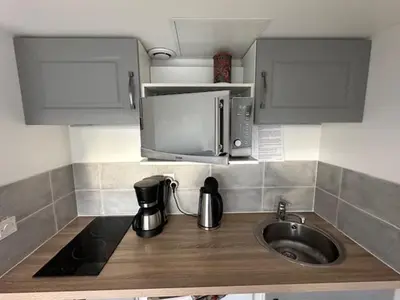 Cuisine ou kitchenette dans l'établissement CHARAVEL