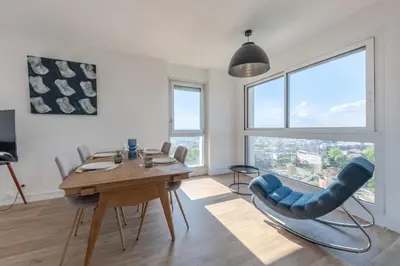 Coin salon dans l'établissement Appartement des Tourelles - Welkeys