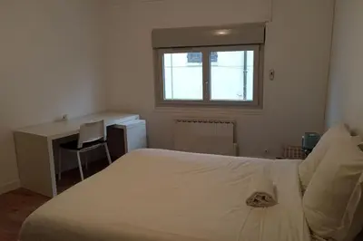 Un ou plusieurs lits dans un hébergement de l'établissement Le Pélican Villardois - 2 chambres - centre