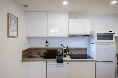 Cuisine ou kitchenette dans l'établissement Casa Azul - Belle maisonnette colorée - Garibaldi