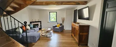 Coin salon dans l'établissement Chambres d'Hotes Le Panoramic Chiroubles Beaujolais