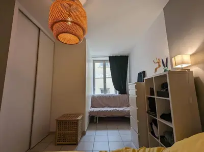 Un ou plusieurs lits dans un hébergement de l'établissement Mirador T2 ensoleillé place des Terreaux vue Fourvière
