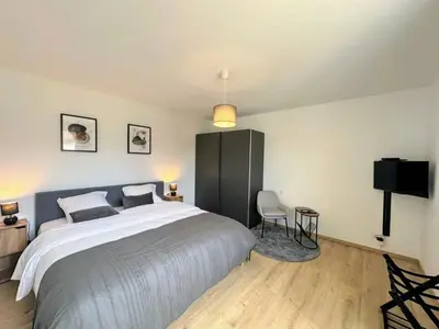 Un ou plusieurs lits dans un hébergement de l'établissement Cosy 152 proche aéroport -gare-groupama stadium-lyon