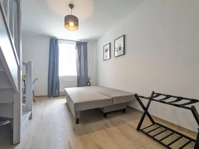 Un ou plusieurs lits dans un hébergement de l'établissement Le PRESTIGE 152 proche aéroport -gare Lyon -groupama stadium-ldlc arena