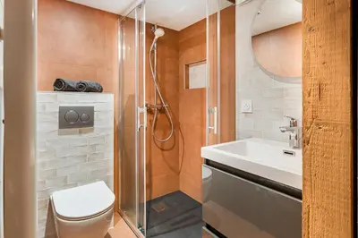 Salle de bains dans l'établissement Le Four' Nid
