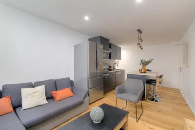 Cuisine ou kitchenette dans l'établissement Cosy et Charmant wifi très haut débit