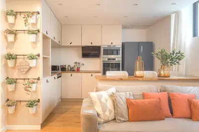 Cuisine ou kitchenette dans l'établissement Cosy et Chaleureux wifi très haut débit