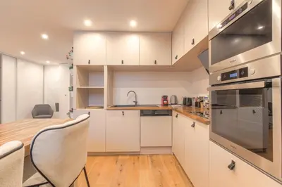 Cuisine ou kitchenette dans l'établissement Cosy et Chaleureux wifi très haut débit