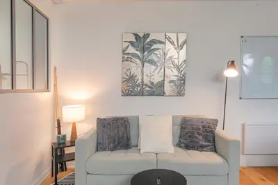 Coin salon dans l'établissement Cosy et Calme idéal déplacement pro