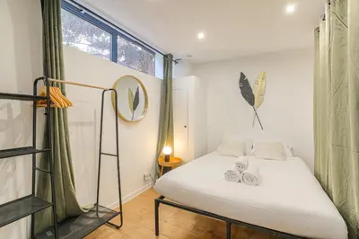 Un ou plusieurs lits dans un hébergement de l'établissement Cosy et Calme idéal déplacement pro