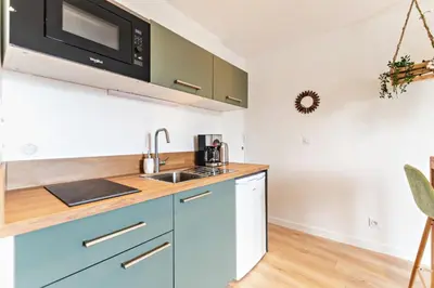 Cuisine ou kitchenette dans l'établissement Chez Quentin & Thibaut