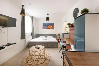 Un ou plusieurs lits dans un hébergement de l'établissement Chaleureux Studio 2 pers