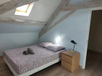 Un ou plusieurs lits dans un hébergement de l'établissement MONTALIEU SEJOUR Duplex Tournesol, prox CNPE Bugey, PIPA, vallée Bleue