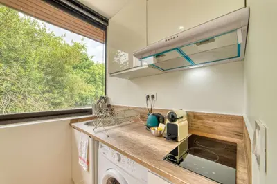 Cuisine ou kitchenette dans l'établissement Le Petit Gerland - Agréable à 1 minute du métro B