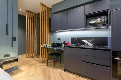 Cuisine ou kitchenette dans l'établissement Love Room Balneo Sauna Pierre Corneille !