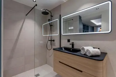 Salle de bains dans l'établissement Love Room Balneo Sauna Pierre Corneille !