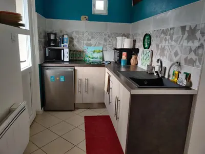 Cuisine ou kitchenette dans l'établissement Studio Belle Vue
