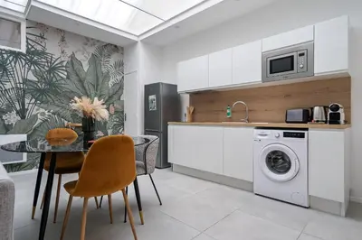 Cuisine ou kitchenette dans l'établissement Loft DYANE - Le Méridien #Parking #Lave-linge #Clim #Netflix