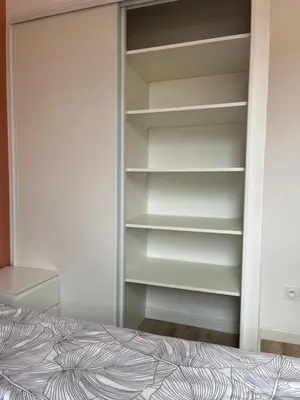 Un ou plusieurs lits dans un hébergement de l'établissement Superbe 3 chambres proche lyon et eurexpo parking