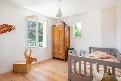 Un ou plusieurs lits dans un hébergement de l'établissement La Saulière - Family house with zen and trendy decoration