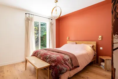 Un ou plusieurs lits dans un hébergement de l'établissement La Saulière - Family house with zen and trendy decoration